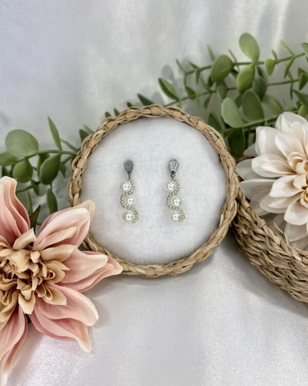 Crista-korvakorut, hopea